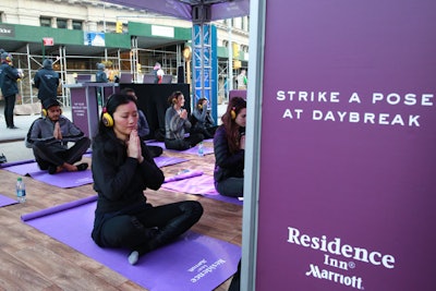 An activity called 'Strike a Pose at Daybreak' included a free yoga class and a 'silent disco' street party put on by Headphone Disco.