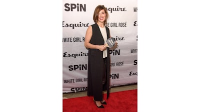 Actress Marina Squerciati walks the red carpet at SPiN Chicago’s grand opening party.