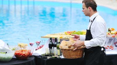 A wine and cheese station at Mamaroneck Beach and Yacht Club’s pool