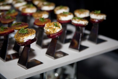 Toben Food by Design served roasted beets topped with goat cheese, pistachio, and arugula at the Three to Be Foundation’s Stems of Hope Gala in September 2011, held at the Guvernment & Kool Haus Entertainment Complex in Toronto.