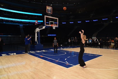 During the marketplace portion of the evening, guests had the opportunity to shoot hoops with New York Knicks legends John Starks and Larry Johnson in hopes of winning prizes, including a cruise from Fathom Cruises, a bike from TokyoBike, a Michael Stars gift card, and signed jerseys from Carmelo Anthony and Kristaps Porzingis.