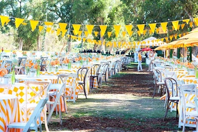Bunting hung over 170 tables for 700 guests in the V.I.P. picnic space within the Veuve Clicquot Polo Classic in Los Angeles in 2013.