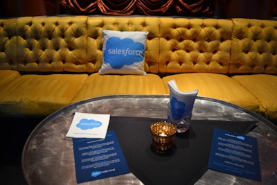 Organizers used Salesforce pillows, napkins, and a beverage menu to customize Surrender nightclub for the party.