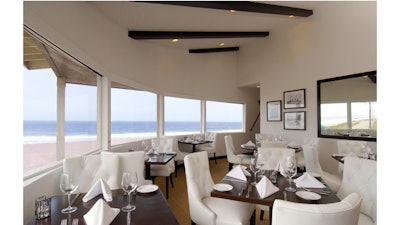 The restaurant breathes with space and light thanks to its expansive front windows overlooking the Pacific.