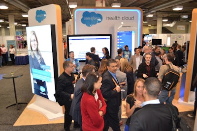 Salesforce staff demonstrated the new Health Cloud product on two larger-than-life displays made to look like an iPhone and a desktop computer.