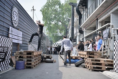 The March 16 opening-night event took place in 10 international markets, including Kuala Lumpur, Malaysia (pictured). Held at a warehouse space, the event included a skateboard competition.