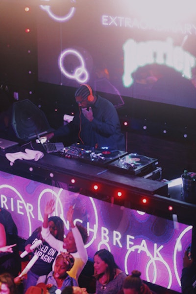 Questlove was the event's DJ, spinning from behind a customized LED-covered DJ booth. He will return to DJ a second lunch break event in New York on March 16.