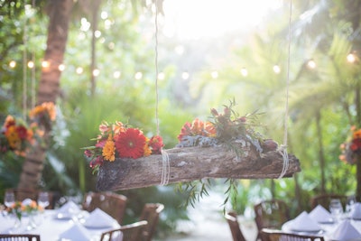 For a wedding in Tulum, Mexico, at Cabanas La Luna, Smith and her team chose to combine the florals with the lights for a dreamy effect.