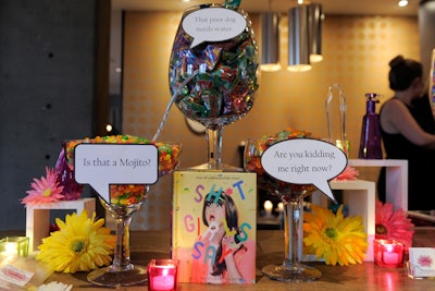 A 2012 launch in Los Angeles for Sh*t Girls Say played up the content from the book. To that end, speech bubbles decorated a candy buffet with messages like, “Can you do me a huge favor?” and “Shut up.” Brightly colored gerbera daisies also decorated the setup.