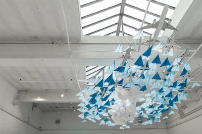 In June 2015, the trio created a 400-paper-plane installation for a KLM pop-up in New York.