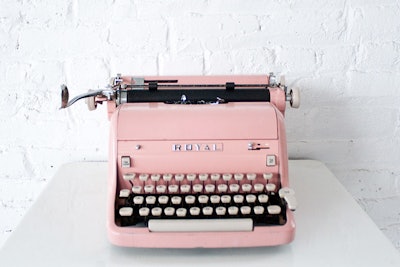 Pink typewriter, $80, available nationwide from Patina Vintage Rentals