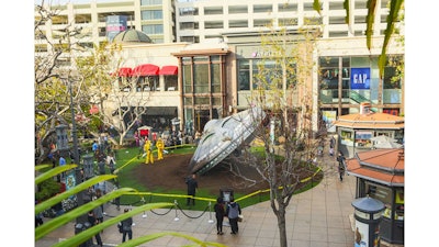 A UFO crash-lands at the Grove as a stunt to promote the new X-Files series on Fox.