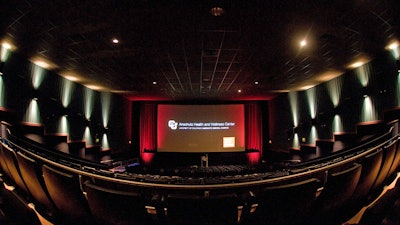 Uplighting and custom on-screen content add exclusivity to events at the movies.