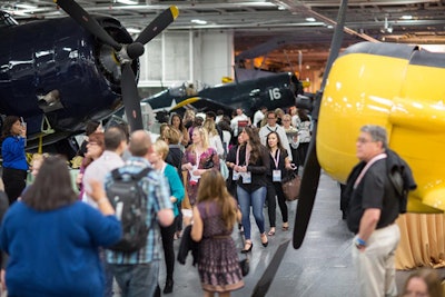 The conference began with an opening night party aboard the U.S.S. Midway aircraft carrier.