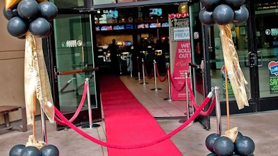 A red carpet entrance complete with velvet ropes