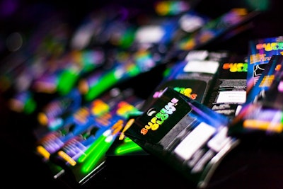 Guests could grab packages of green glow-stick earrings as party favors at the National Pancreas Foundation's Young Professionals' 'Punk Goes to Discotheque' benefit, which was held at the Oberon at the American Repertory Theatre in Boston in 2010.