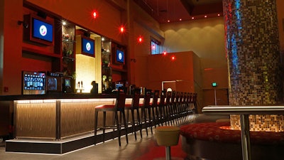Equipped with a bar, this movie theater is made for appreciation events.