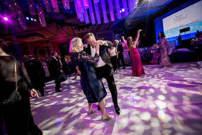 After the evening's program, guests took the dance floor as live band Maggie Speaks performed. Earlier in the evening, guests also crowded the dance floor during a set from country singer Hunter Hayes.