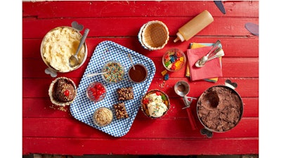 A sundae bar by delivery with vanilla and chocolate chip ice cream and five toppings