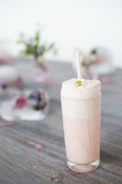 Raspberry Ramos Gin Fizz with Green Hat gin, raspberry, sugar, egg white, and soda water, by Evoke in Silver Spring, Maryland, and Stir Bartending Company in Washington
