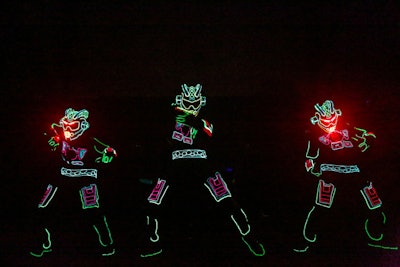 A trio of iLuminate dancers in bespoke LED suits performed during Alienware's laptop launch event at E3 in 2013.