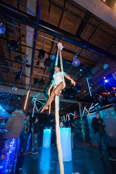 Entertainment included aerialists who glowed when a black light hit them.