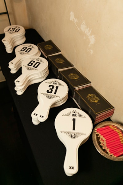 At the entrance, attendees were given branded auction paddles and a guide to items from the Coveted Collection that were given away later in the night.
