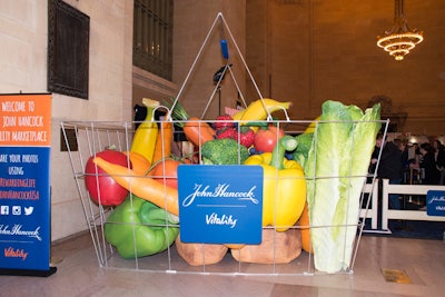 The marketplace featured a 12- by 8-foot shopping basket filled with larger-than-life produce that served as a photo op.