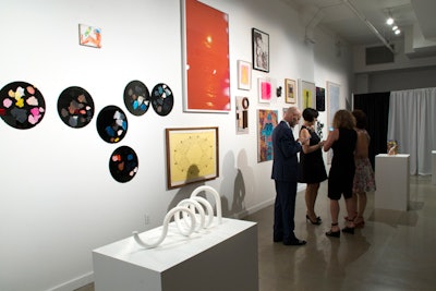 The silent auction hung salon-style on the first floor and included work from Olaf Breuning, Jeff Koons, and Elmgreen and Dragset.