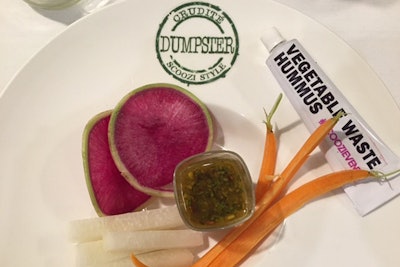 The dumpster crudité platter included vegetable pulp hummus made from pressed juices and canned chickpea water debris that was served in a squeezable tube, along with a pickle juice vinaigrette.