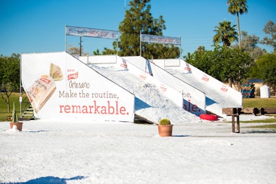 The event included snow day activities such as sledding on branded inner tubes.