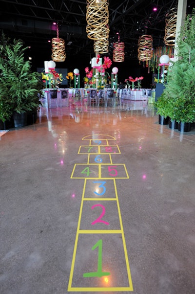 Hopscotch outlines on the floor added to the playground vibe.