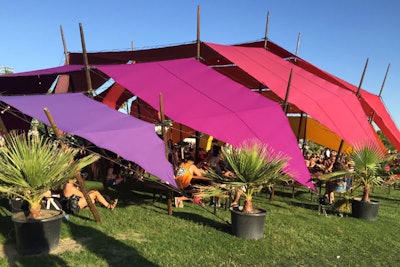 Colorful structures also served as shade covers for guests on the otherwise mainly exposed festival grounds, as heat soared into the 90s.