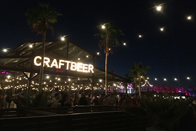 A tented section for guests ages 21 and older serving beer felt like an intimate garden despite its size, covered in string lights and surrounded by residential-like fencing.