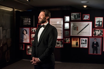Montblanc brand ambassador Hugh Jackman posed for photographs and helped film a special Montblanc tribute video in the Gallery space. Behind him was a photographic timeline showcasing the brand's 110-year history.