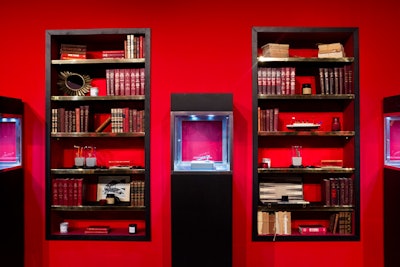 Creating a decidedly residential feel, the color scheme of the red walls accented with black furniture displays was directly inspired by Montblanc's Rouge et Noir writing instrument collection, which was reintroduced that night as part of the anniversary collection.