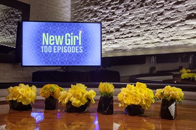 In March, Russell Harris Event Group produced a Fox party to celebrate the 100th episode of New Girl. Squat arrangements of monochromatic yellow blooms popped against tabletops.