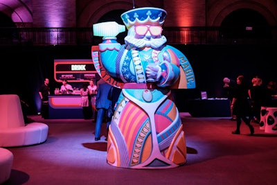 The event's logo was a colorful king, inspired by the king that appears on playing cards. The figure, which was shaking a cocktail and holding a martini, appeared in signage and in a giant statue at the events.
