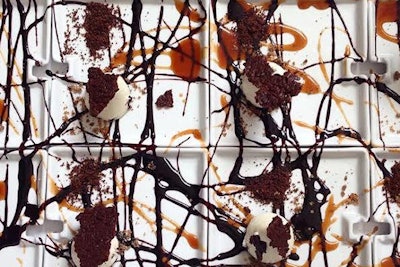 Tiramisu made with mascarpone mousse, chocolate cake, espresso cake puree, and coffee crumbs, presented in the abstract style of Jackson Pollock, by Pinch Food Design in New York