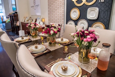 In February, World Kitchen took over a New York City townhouse and transformed it into a showcase of its products for influencers and bloggers. Alongside decor made from kitchenware, ranunculus in shades of red and pink decorated mixed-metallic tabletops.