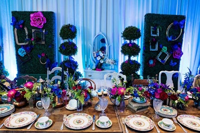 Urban Decay hosted an event at Disneyland in April to celebrate the brand’s Alice in Wonderland collection for the upcoming Through the Looking Glass Disney movie. Colorful blooms decorated a table set for a tea party with fancy china, and decorated hedging and topiaries alongside it.
