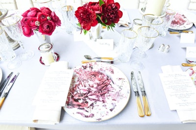 Dinner tables covered in pale blue and lavender cloths featured silver cup centerpieces with red, burgundy, and lavender florals. Custom-printed chargers had a deconstructed rose pattern, a nod to the 'machina' aspect of the exhibit. 'You can’t take the theme too literal … you have to think about what the party is about and let the exhibition shine,' said Avila.