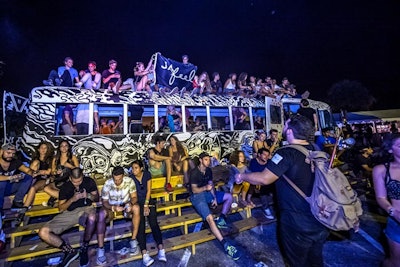 A retrofitted school bus doubled as a lounge area for attendees.