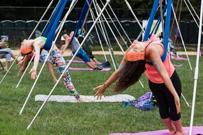 In 2015, Wanderlust 108 Brooklyn offered activities such as slacklining and acroyoga (pictured).