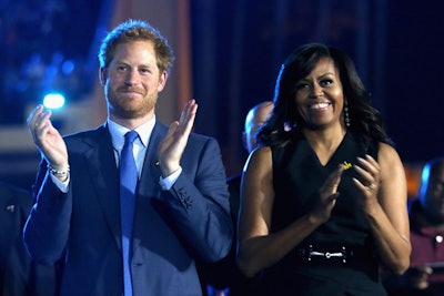 Britain’s Prince Harry, founder of the Invictus Games, and first lady Michelle Obama spoke at the opening ceremonies Sunday night.