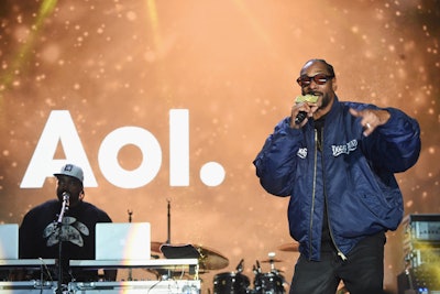 The AOL show 'Coach Snoop' follows Snoop Dogg's inner city youth football league; the rapper performed at the event.