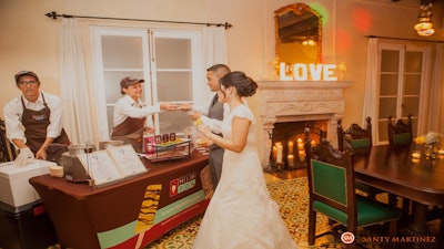 POPup gelato table at indoor wedding.