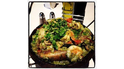 Amazon rainforest-inspired green paella