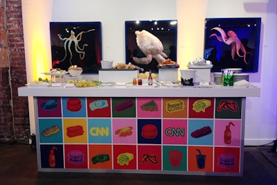 Occasions Caterers served comfort foods at CNN's Political Hangover brunch. Mini chicken and waffles, biscuits and gravy, and sliders lined Pop Art-inspired buffet stations from Design Foundry.