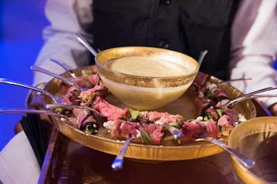 Occasions also passed espresso-crusted smoked beef carpaccio served on individual forks with a spicy herb salad as part of the early menu.